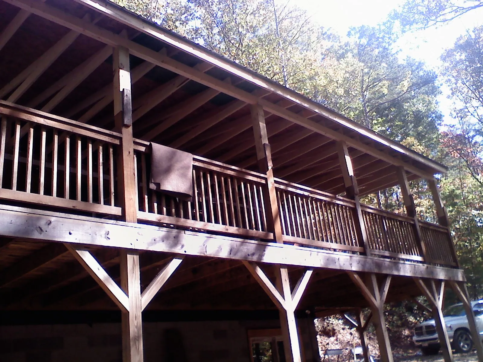 Timber framing under a new elevated porch and deck — Roof Leak Repair in Chocorua by Roofing Brothers